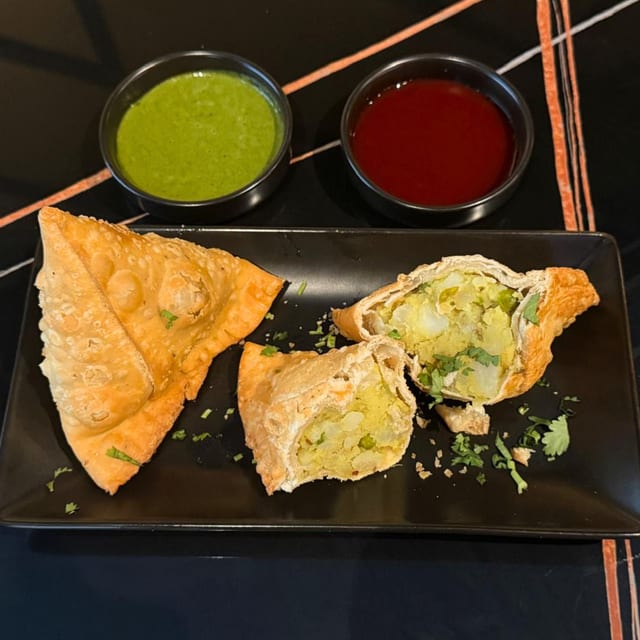 Samosa Singh — Two Crispy Punjabi Classics.