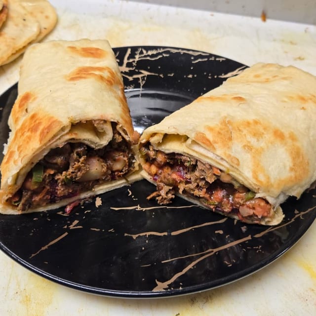VeerGi Lamb Seekh Sizzle — Spiced Lamb Kabob Naan Pocket.